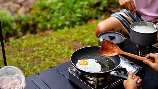Use a camp stove for daytime cooking