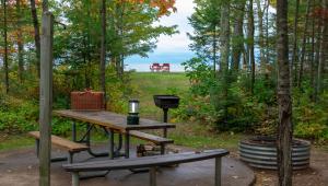 5 Picturesque Cabins & Campgrounds with Lakes to Visit This Fall